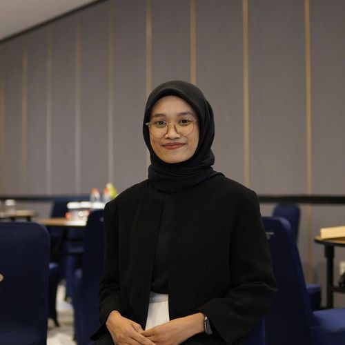 Active young man smiling in a bright room